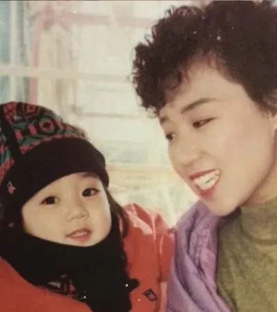 a person holding a baby