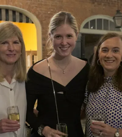 a group of women smiling