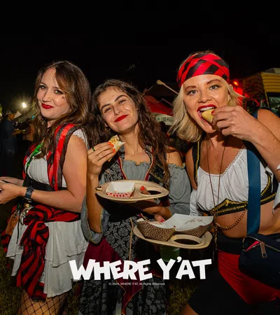 a group of women holding food