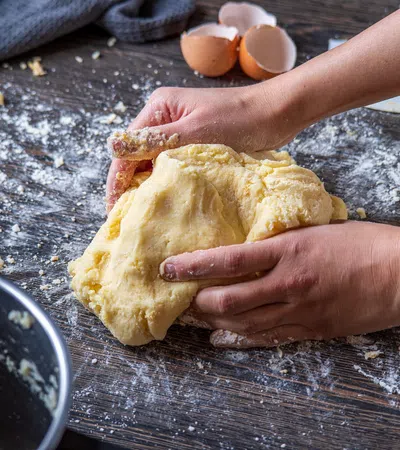 a person making a sandwich