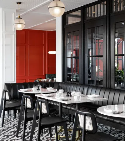 a room with tables and chairs