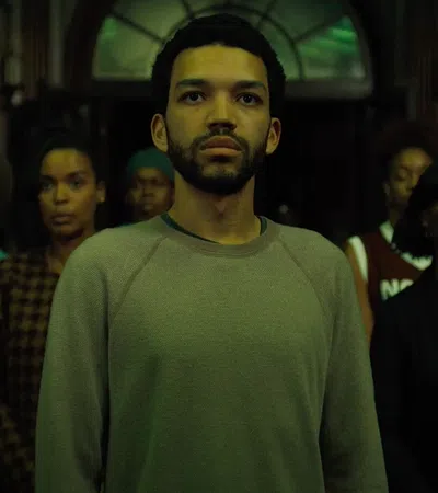 Justice Smith in a green shirt