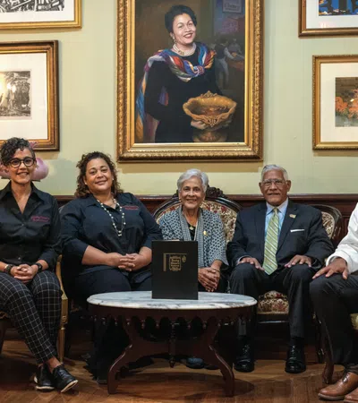 a group of people sitting in chairs