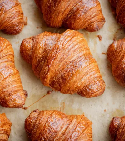a group of pastries on a white surface