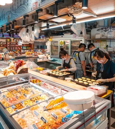 people standing in a food market