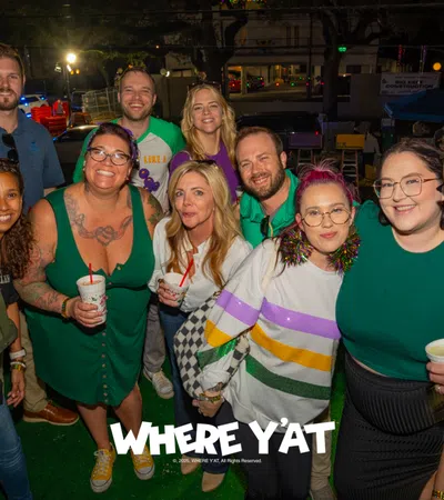 a group of people posing for a photo