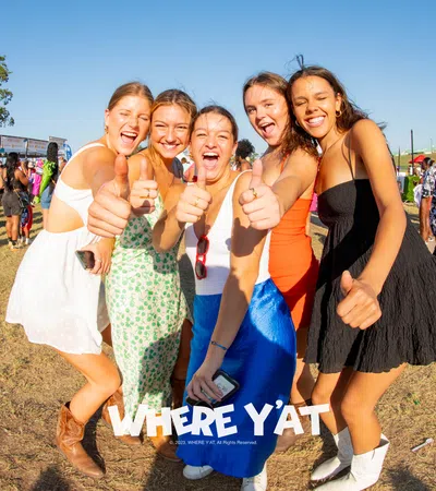 a group of women posing for a picture