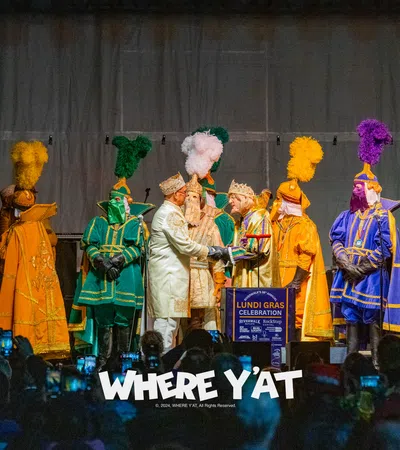 a group of people in clothing on a stage