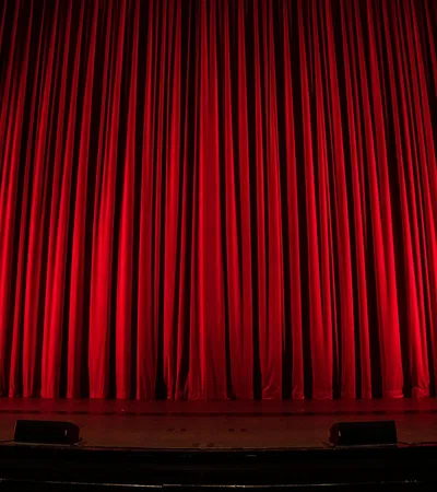 a stage with a curtain