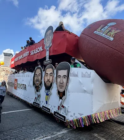 a truck with a large red balloon on the back