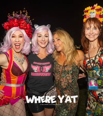 a group of women posing for a photo