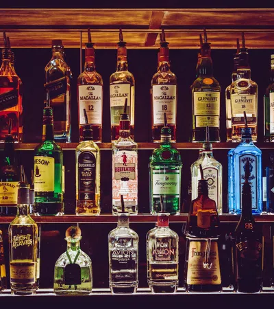 a shelf of alcohol