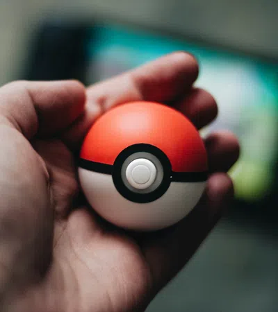 a hand holding a ball