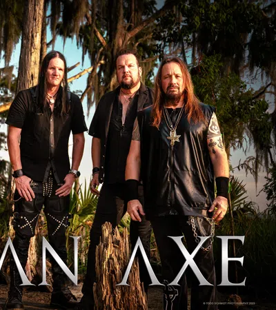 Five members of the heavy metal band Lillian Axe posing outdoors with trees in the background and band name overlay.