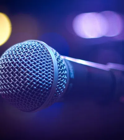 a microphone with a blue background