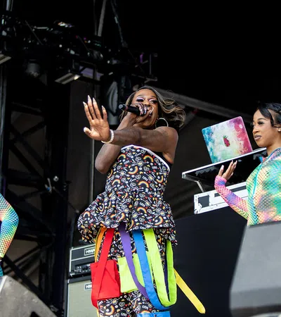 a person singing into a microphone