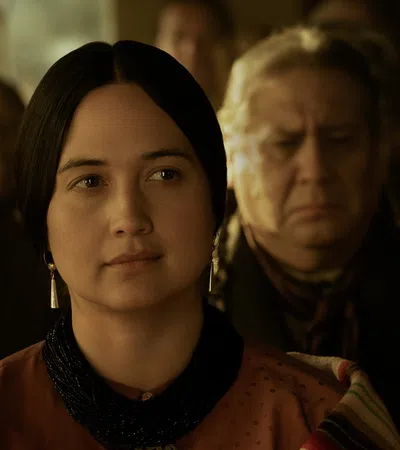 Lily Gladstone looking at the camera