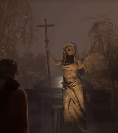Person facing eerie stone angel statue holding a cross in a foggy, dimly lit, wooded cemetery at night