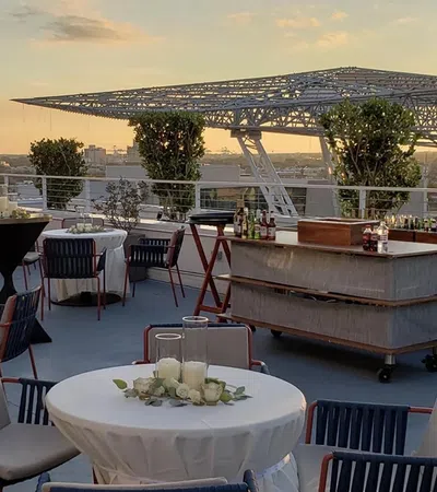 a group of tables and chairs outside