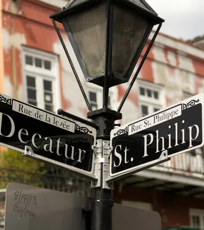 a street sign is posted on a pole