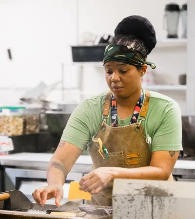 a person in a kitchen