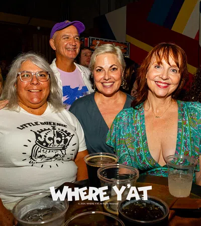 a group of people posing for a photo