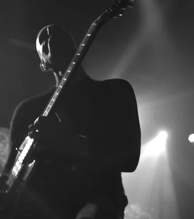 a person playing a guitar