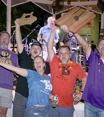 a group of people posing for a photo
