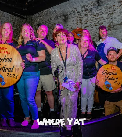 a group of people posing for a photo
