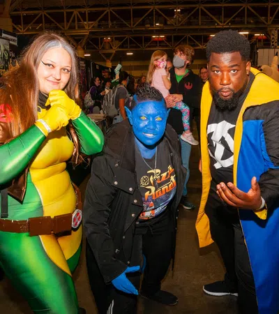 a group of people dressed up in clothing