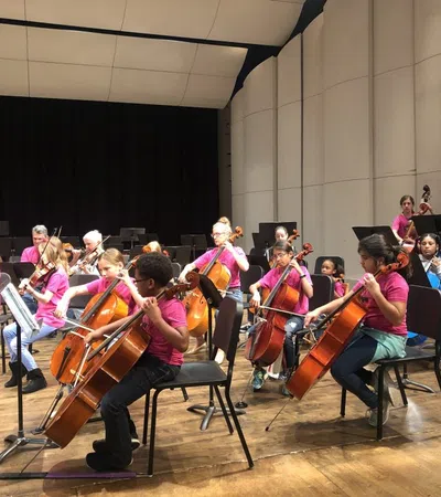 a group of people playing instruments