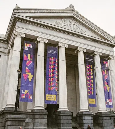 a building with columns and a staircase