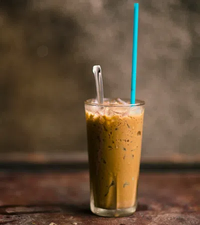 a glass with a straw and a straw in it