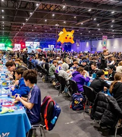 a group of people sitting at tables