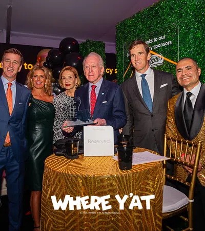Rafael Natal, Eli Manning, Archie Manning, Cooper Manning posing for a photo