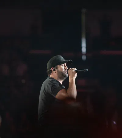 a man singing into a microphone