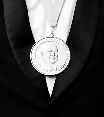 a person wearing a suit and tie