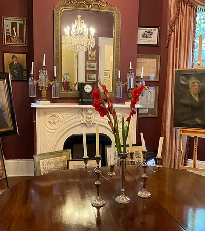 a table with candles and flowers on it