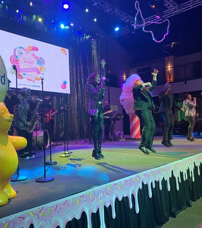 a group of people performing on a stage