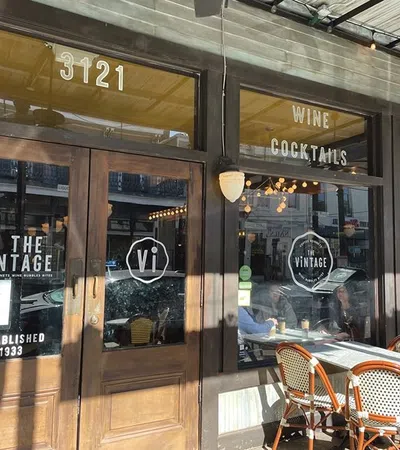 a restaurant with a table and chairs