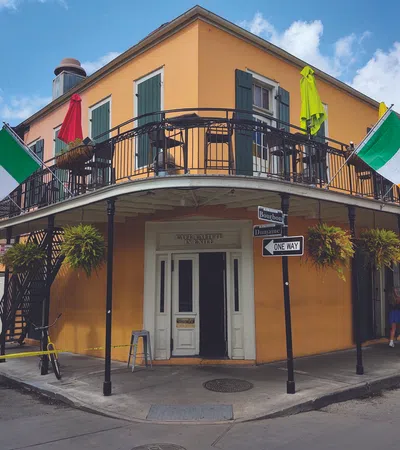 a building with flags on the roof