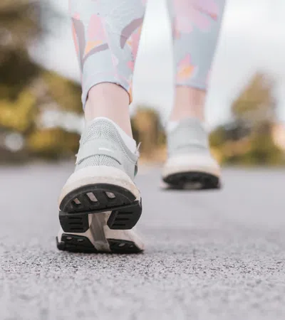 a person's legs and shoes