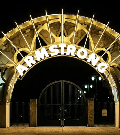 a large gold gate with a circular design on it