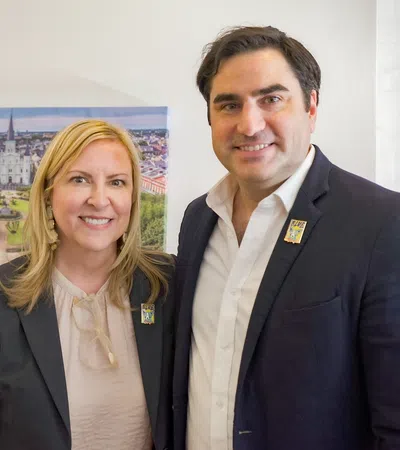 a man and a woman smiling
