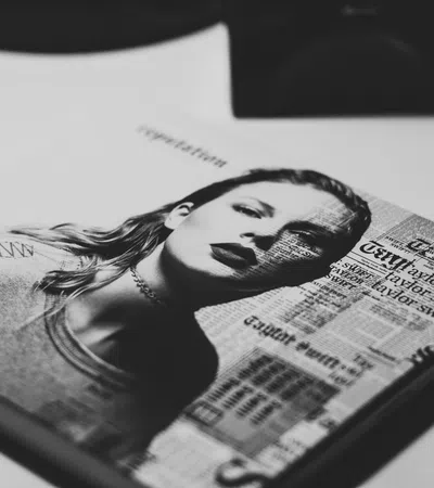 a woman's face on a book