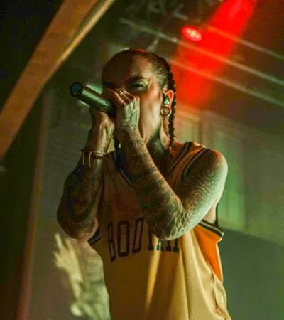 a person singing into a microphone