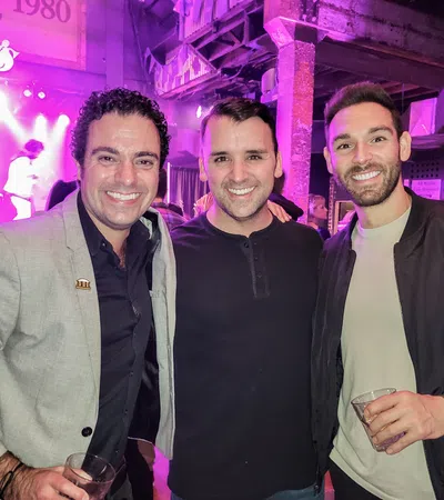 a group of men posing for a picture
