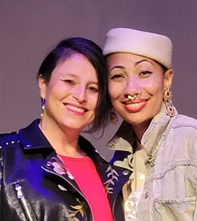 a couple of women smiling
