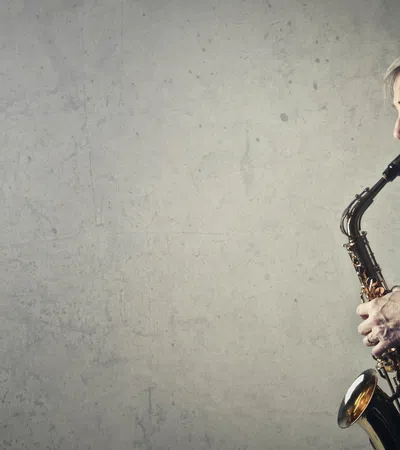 a man playing a saxophone