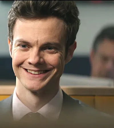 Jack Quaid smiling at the camera